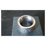Silver Colored Ring Band with Wave Design.