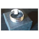 Silver Colored Ring Band.
