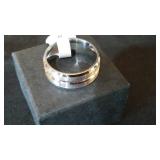 Silver Colored Ring Band.