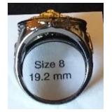 Charcoal Grey Colored Metal Ring with Lion Head Design.