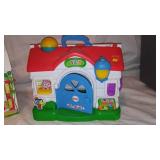 Fisher Price Barn, Melissa and Doug Barn, John Deere Tractors, and Little People.