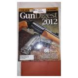 Gun Digest (3) and Pistol and Revolver Digest.