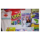 Child Learning Melissa and Doug Scavenger Hunt, Zingo, UNO, and many more.
