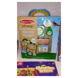 Child Learning Melissa and Doug Scavenger Hunt, Zingo, UNO, and many more.