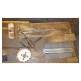 Hole saw bits with assorted drill bits in Toolbox.