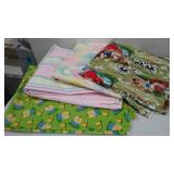 Cotton, Fleece, Flannel Fabric Remnants in Covered tote.