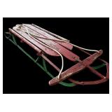 Vintage Red and Green Sleigh and Old Skates with Greens and Red Laces