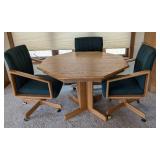 Vintage Round Dining Table and Rolling Chairs