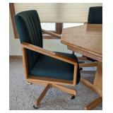 Vintage Round Dining Table and Rolling Chairs