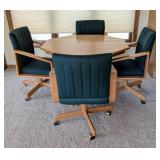 Vintage Round Dining Table and Rolling Chairs