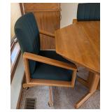 Vintage Round Dining Table and Rolling Chairs