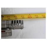 Silver-Colored Toy Ray Gun with Steampunk Design