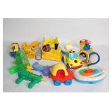 Collection of Vintage Plastic Toy Cars and Playsets