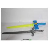 Collection of Toy Bats, Swords, and Paddle Set