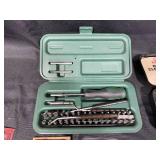 Collection of Hunting and Fire Arm Accessories Including Cleaning Kits and Sharpeners