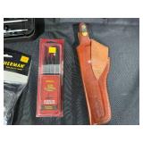Collection of Hunting and Fire Arm Accessories Including Cleaning Kits and Sharpeners