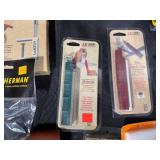 Collection of Hunting and Outdoor Gear with Leather Holster and Tools