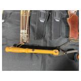 Collection of Hunting and Outdoor Gear with Leather Holster and Tools
