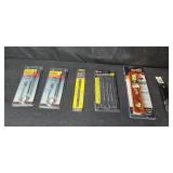 Collection of Hand Tools and Accessories Including Wrenches, Level, and Stud Finder