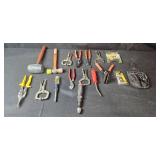 Collection of Hand Tools Including Mallets, Pliers, and Clamps