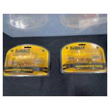 Safety Gear Collection Including Goggles, Ear Protection, and Pipe Clamp