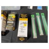 Large Assortment of Knife Sharpening Belts, Music Wires, and Sanding Needles