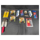 Assorted Tool Collection with Knives, Reamers, Sharpener, and Iron Stand