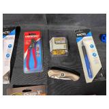 Assorted Tool Collection with Knives, Reamers, Sharpener, and Iron Stand