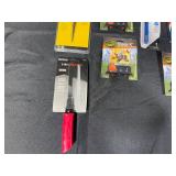 Assorted Tool Collection with Knives, Reamers, Sharpener, and Iron Stand