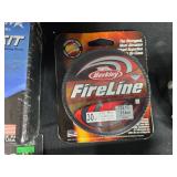 Comprehensive Fishing Gear Lot with Line, Reels, Knives, and Accessories