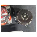 Comprehensive Fishing Gear Lot with Line, Reels, Knives, and Accessories