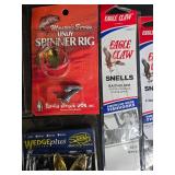 Large Collection of Fishing Lures, Spinners, and Sharpening Tools