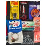 Collection of Fishing Lures, Hooks, and Accessories