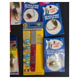 Collection of Fishing Lures, Hooks, and Accessories