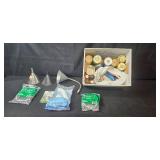 Variety of Plumbing Supplies with Funnels and Container Cap Lids