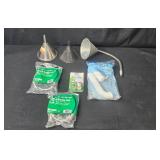 Variety of Plumbing Supplies with Funnels and Container Cap Lids