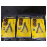 Lot of Leatherman Micra Multitools, Swiss+Tech Utili-Key Tools, and 12-inch Grid Rulers