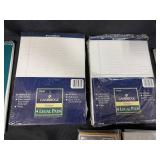 Collection of Office and School Supplies Including Notebooks, Legal Pads, and Cutting Mats