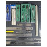 Collection of Drafting Tools including Vernier Caliper and Protractor