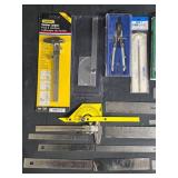 Collection of Drafting Tools including Vernier Caliper and Protractor