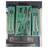 Collection of Drafting Tools including Vernier Caliper and Protractor