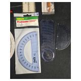 Collection of Drafting Tools including Vernier Caliper and Protractor