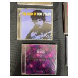 Music CDs Featuring Artists Like Bob Dylan, Chuck Berry, and Janis Joplin