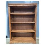 Vintage Wooden Bookshelf with Decorative Trim