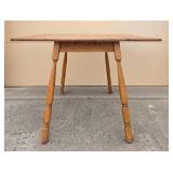 Expandable Oak Dining Table with Drop Leaf Sides