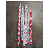 Collection of Holiday-Themed Wrapping Paper Rolls