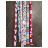 Collection of Holiday-Themed Wrapping Paper Rolls
