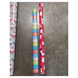 Collection of Holiday-Themed Wrapping Paper Rolls