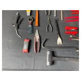 Collection of Various Hand Tools Including Pliers and Hammers