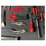 Collection of Various Hand Tools Including Pliers and Hammers